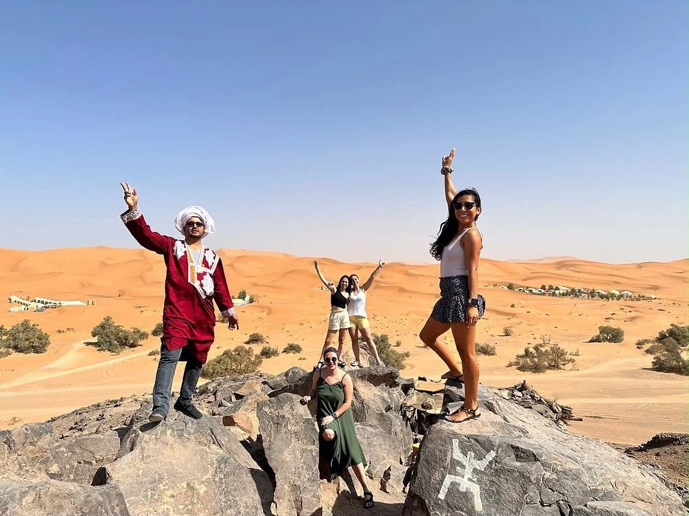 Travellers in the Merzouga desert